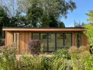 8m x 4m building by Crusoe Garden Rooms Limited