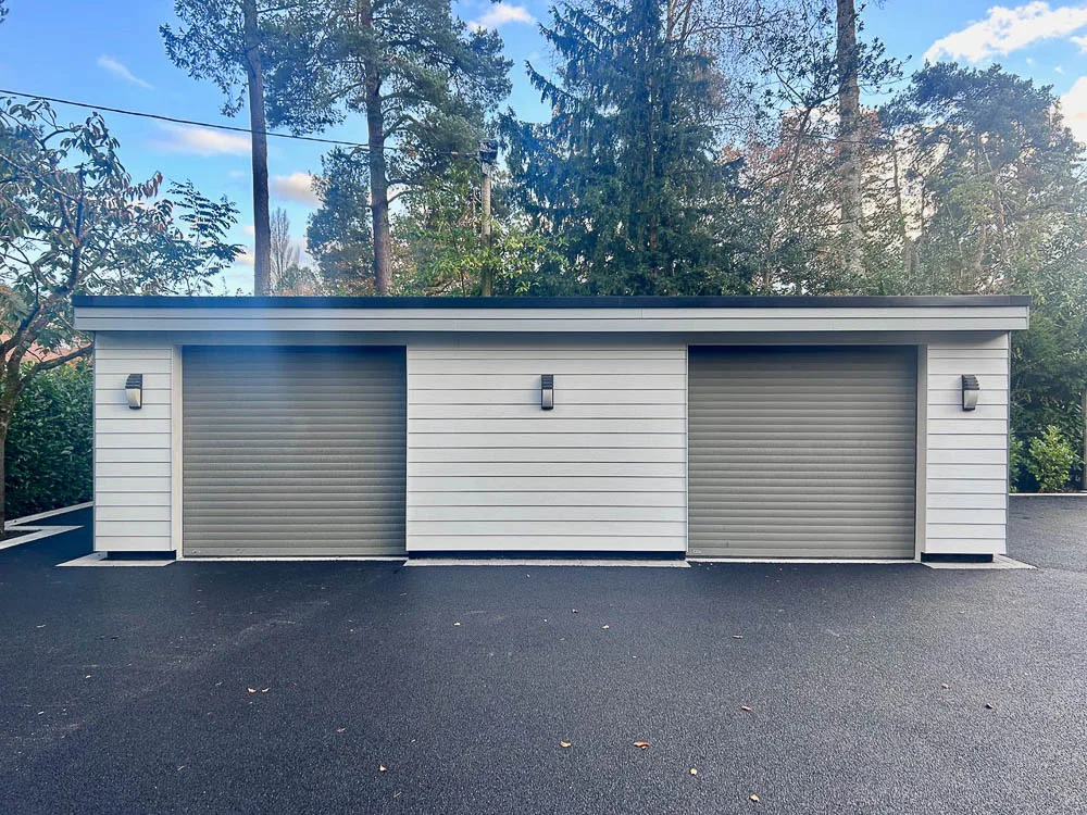 9 x 5.4m insulated double garage with roller shutter doors by Executive Garden Rooms