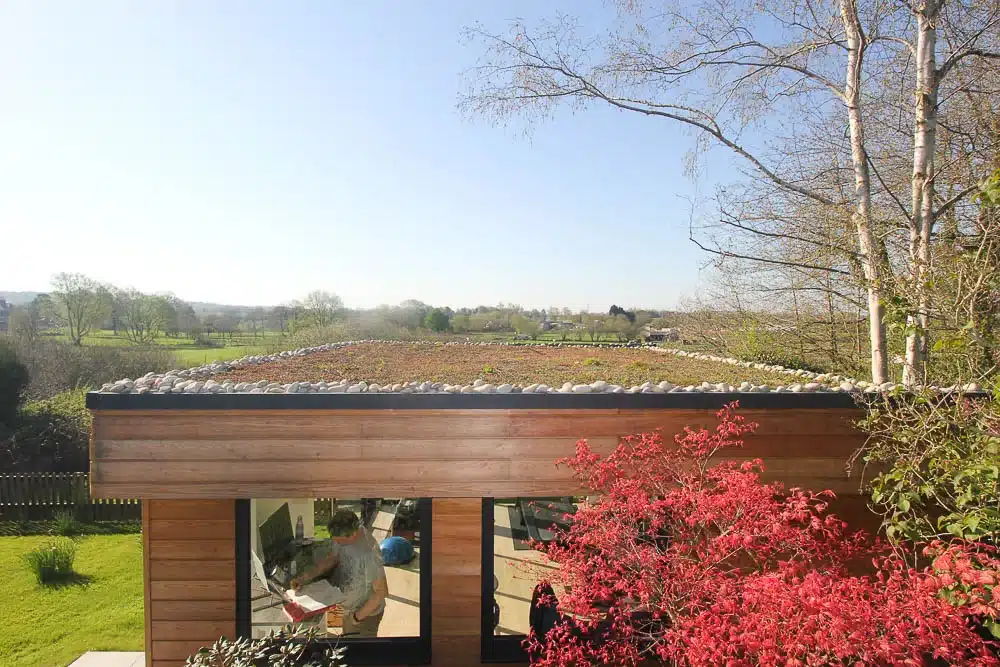 A living roof covering helps the Swift Unlimited garden room blend into the landscape