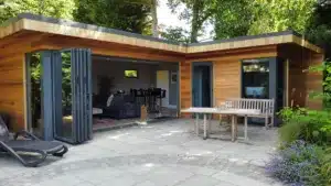 L-shaped garden office and entertainment room with bathroom and kitchen