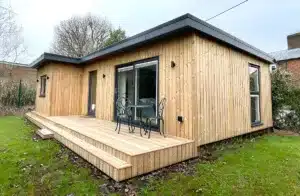 The exterior of the one bedroom annexe has been clad in Thermowood