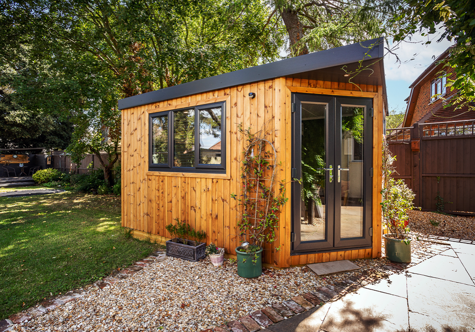 The doors have been positioned at the corner of the building creating a unique porch detail
