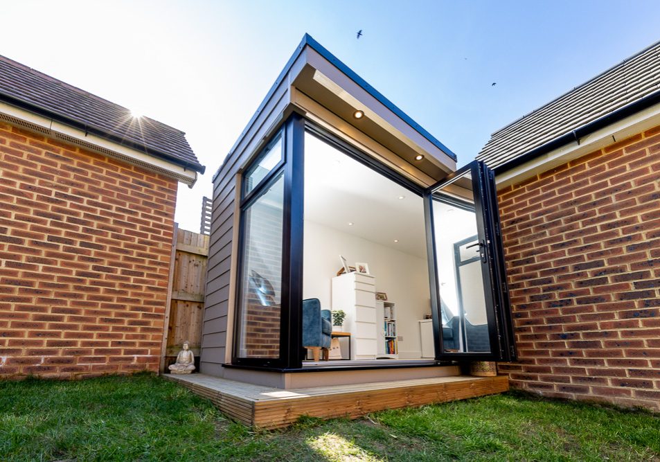 Bi-fold doors open the garden room out onto the garden