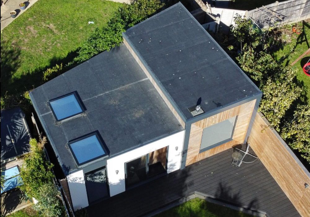 A Room in the Garden designed this multi use garden room to maximise the irregular shaped site