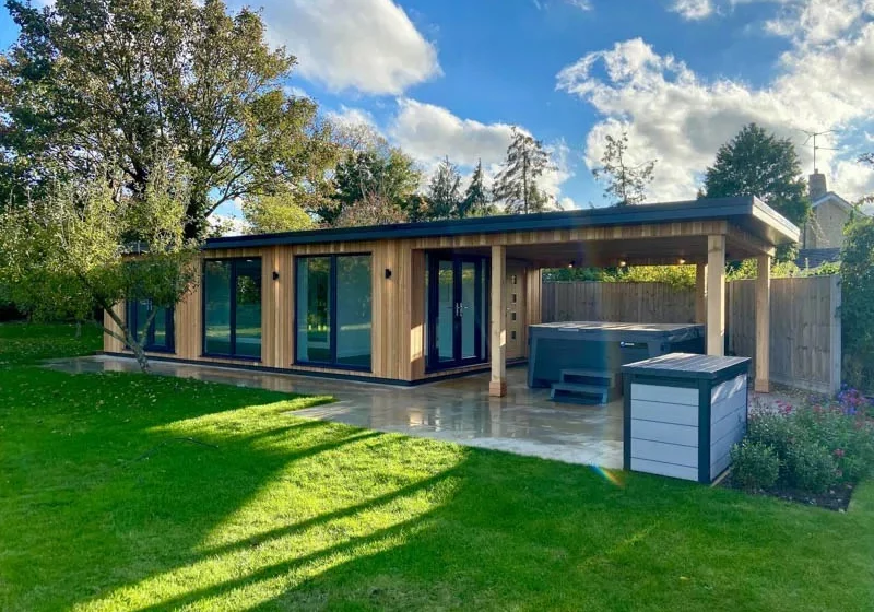Garden gym suite with covered hot tub area