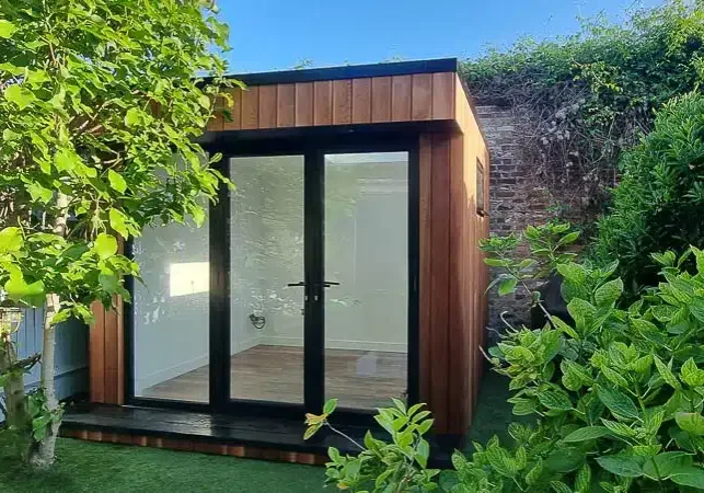 3m x 2.5m garden gym by Garden Spaces designed to slot into a small garden