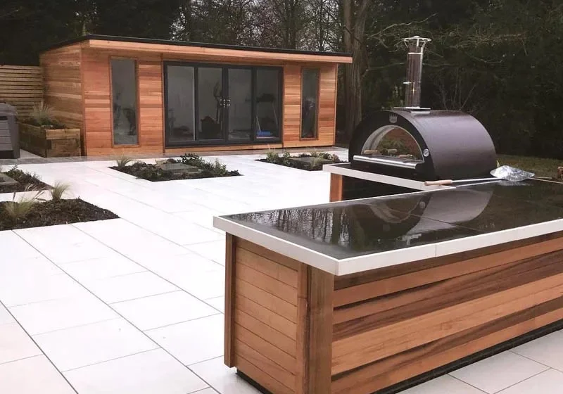 Crusoe garden gym with outdoor kitchen area