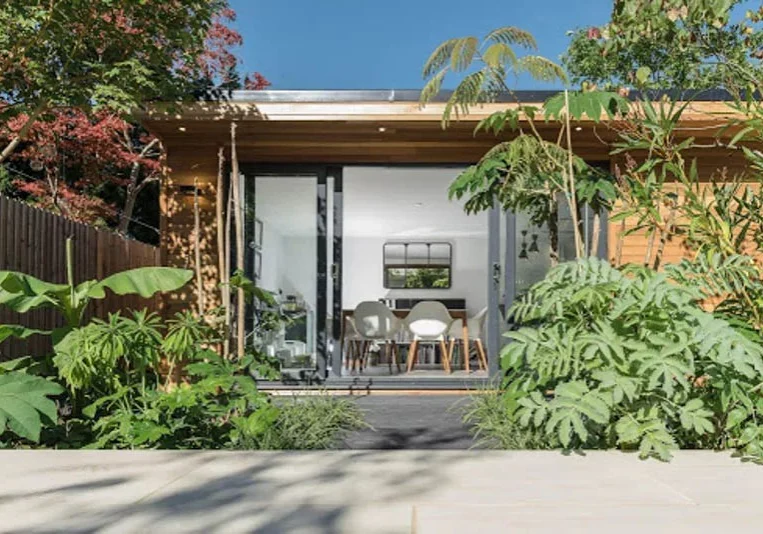An outdoor room enhances a garden