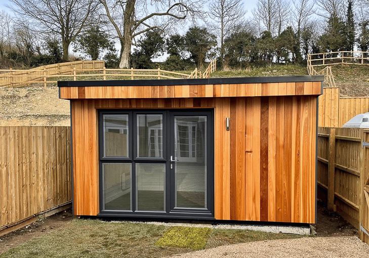 Garden office by Executive Garden Rooms with Cedar front wall and Cedral on the hidden elevations