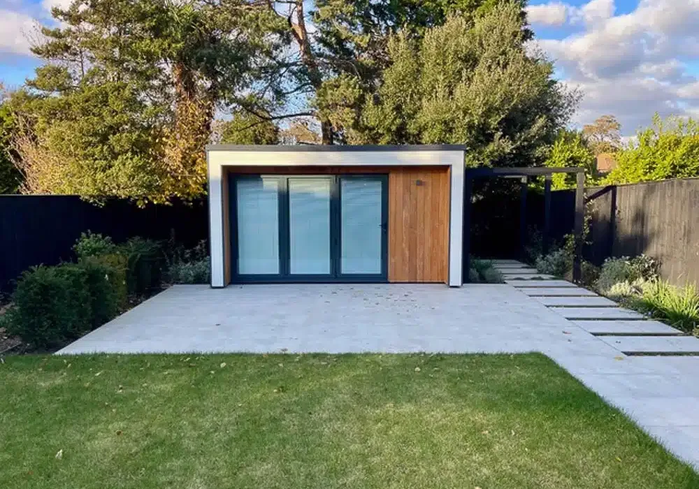 Executive Garden Room that mixes 3 exterior finishes to great effect