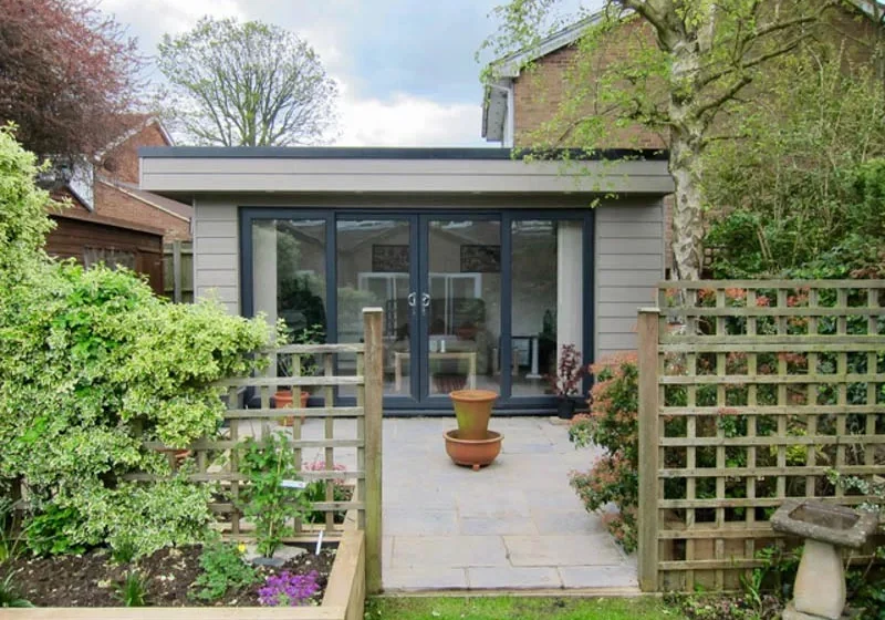 The roof has an overhang just on two sides so it can sit tight to the boundary