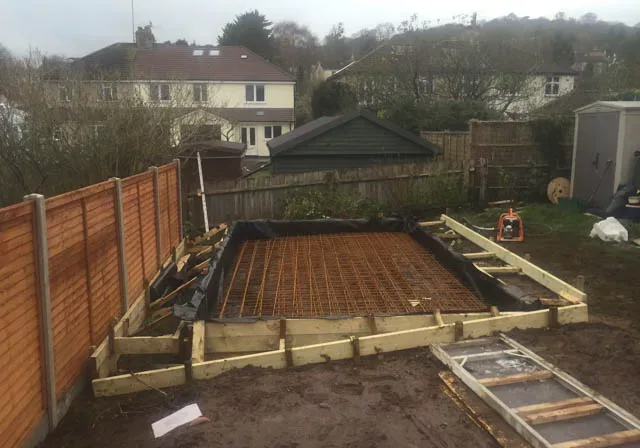 Garden room foundation designed for a sloping site