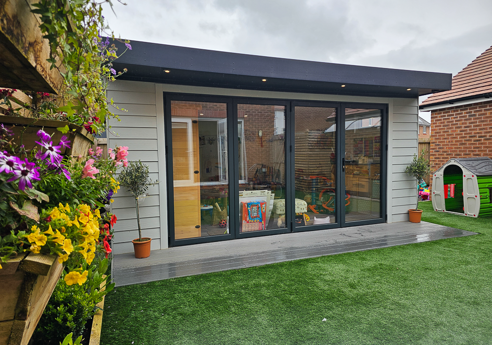 The bi-fold doors can be pushed to one side for indoor-outdoor play