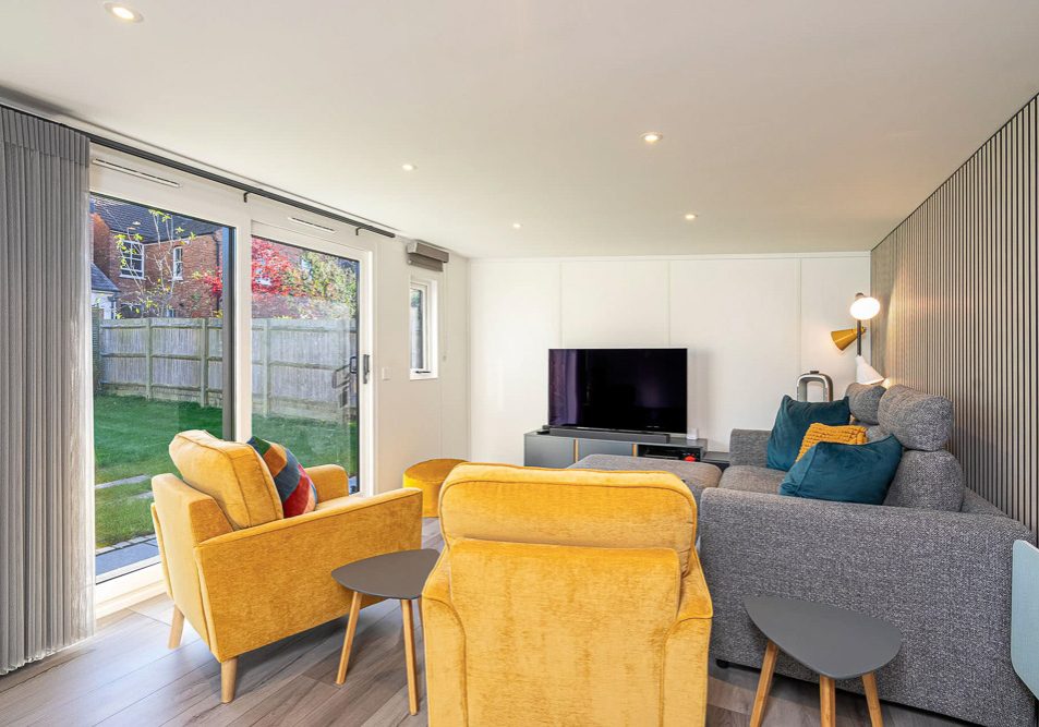 A comfortable garden sitting room has been created in the insulated garden room