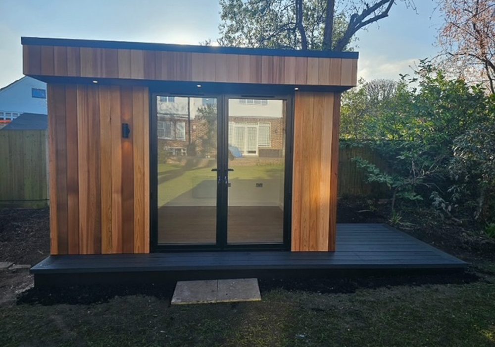 The garden office has been designed to slot into the established garden