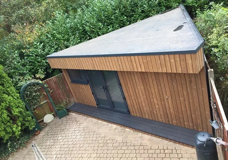 Corner garden room with storage shed