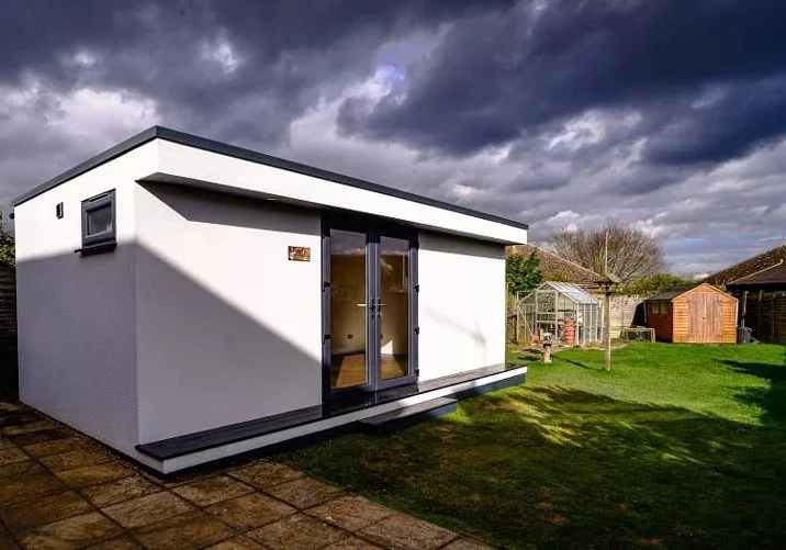 The white render looks crisp with the dark grey doors