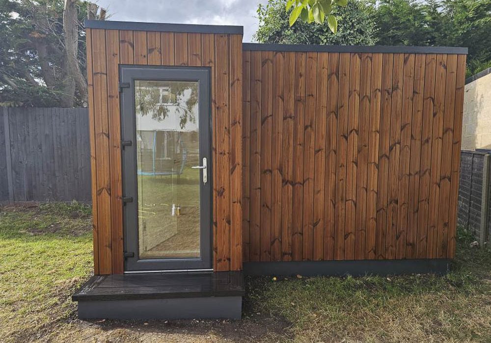 Themowood tongue & groove cladding has been fixed vertically on the prominent elevations