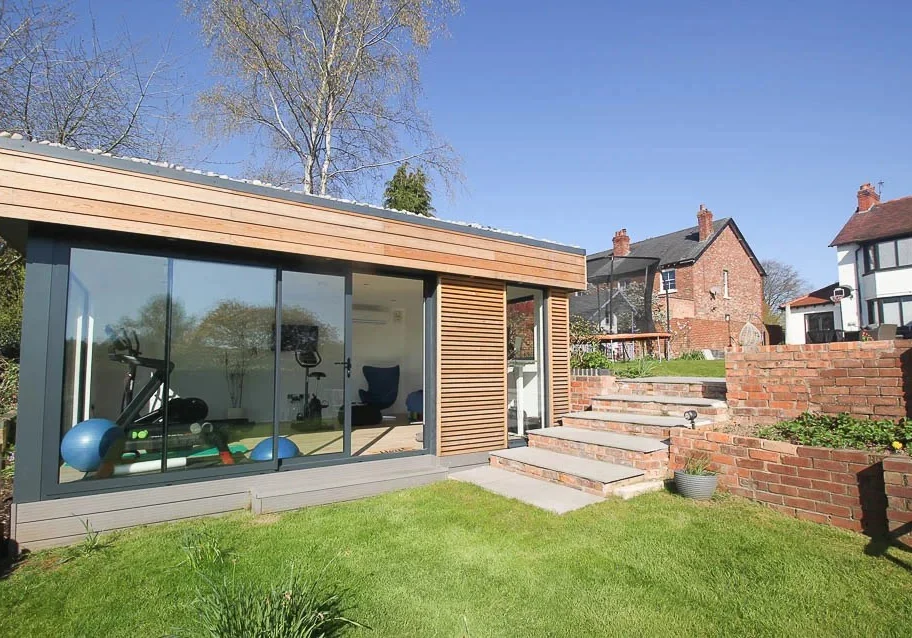 5m x 6m garden office & gym building with Siberian Larch cladding by Swift Unlimited