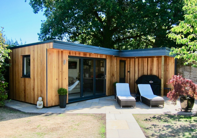 L-shaped garden office and entertainment space by Executive Garden Rooms