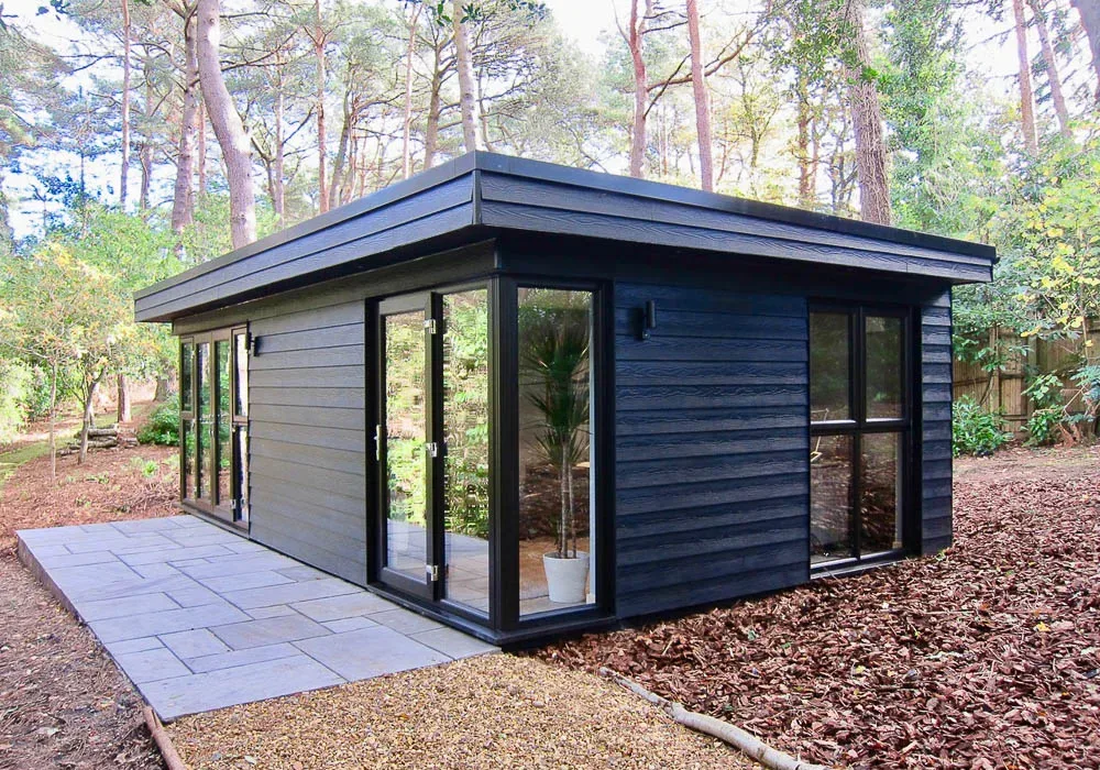 The garden rooms have been positioned in a woodland setting