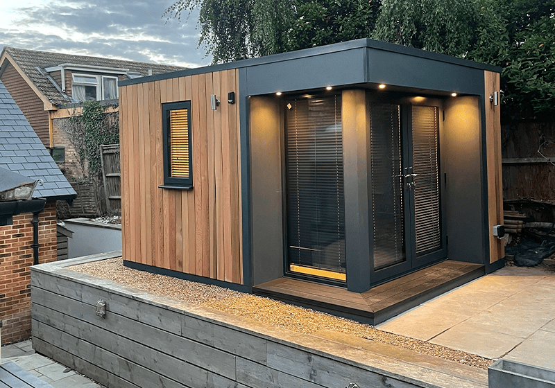 Garden office with a mix of Cedar and cement particle cladding