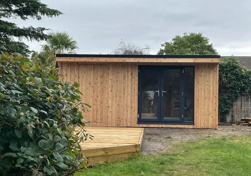 British Cedar clad garden room with store by Hargreaves Garden Spaces