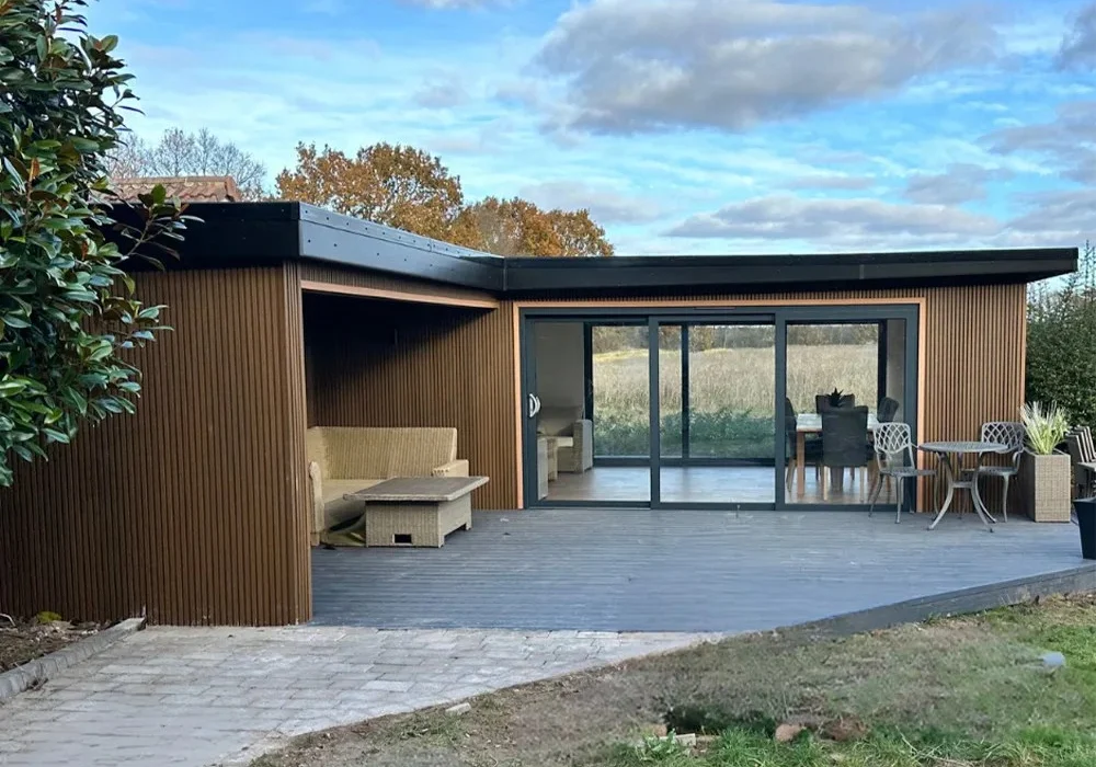 Inside outside entertainment garden room by Heritage Garden Studios