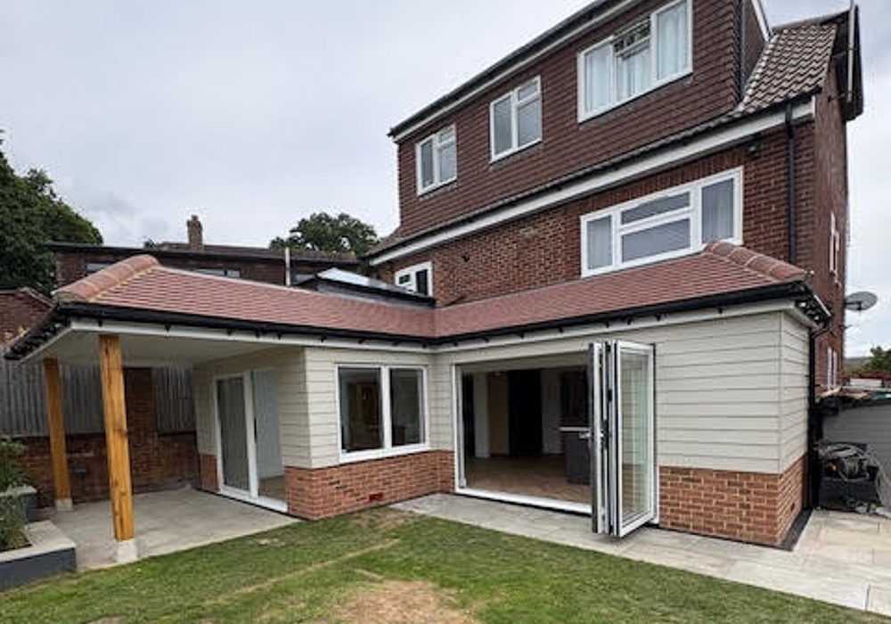 The timber frame extension has extended the living space and created a great connection with the garden