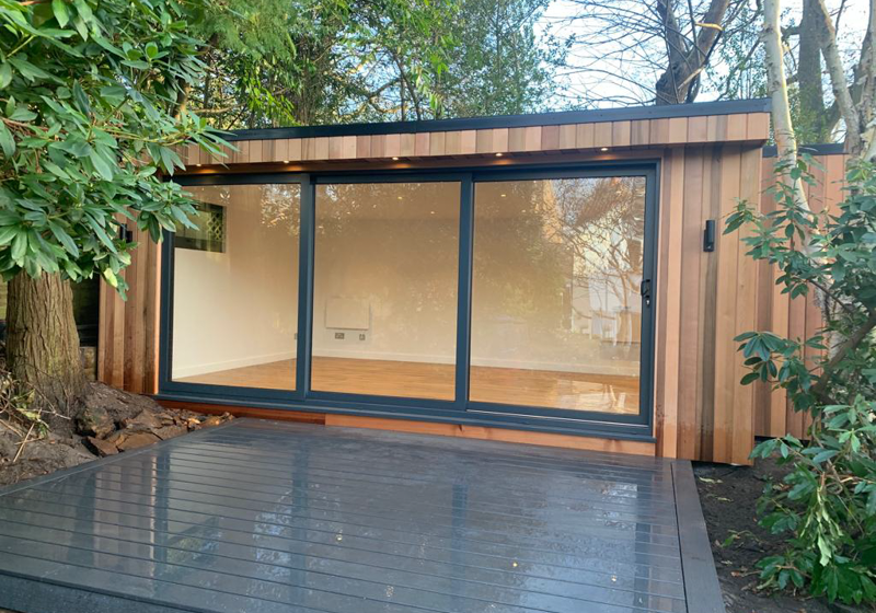L-shape garden room with storage by Ark Design Build