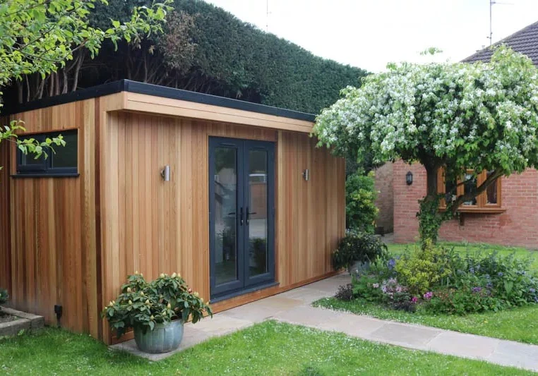 Narrow garden room with shower room