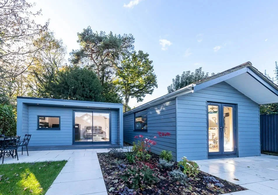 Miniature Manors built this 5m x 3m garden office and refurbished the old garage to match