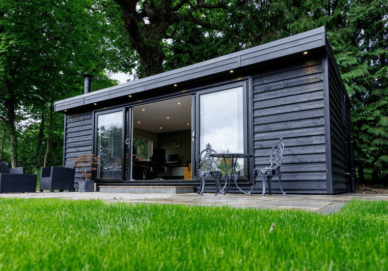 Black clad garden office and gym by Miniature Manors