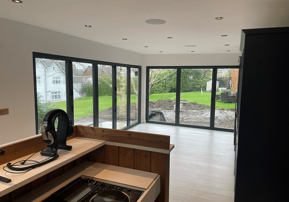 Garden annexe by Ark Design Build designed as a party space with custom DJ booth.