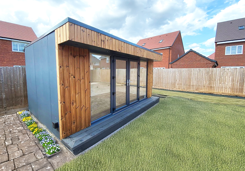 Thermowood cladding has been paired with cement particle board on the other elevations