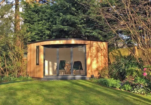 Corner garden sitting room by Swift