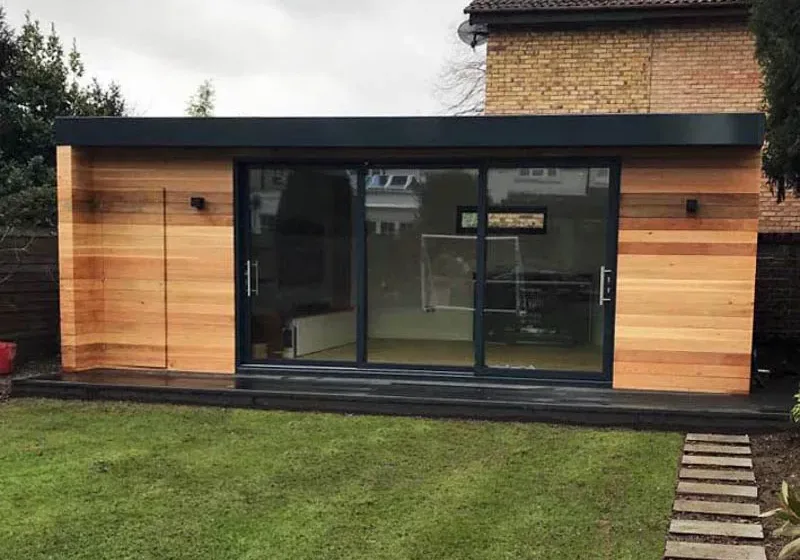 8m x 4.9m garden room with wc, kitchenette and storage shed